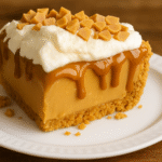 Butterscotch Heaven Pie slice with caramel drizzle and whipped cream