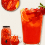 Southern strawberry sweet tea served in a clear glass with ice, fresh strawberries, and lemon for a refreshing summer drink.