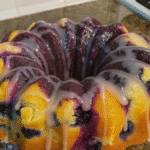 “Classic Blueberry Sour Cream Pound Cake with Glaze Drizzle on Bundt Pan”