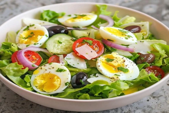 Refreshing Salad with Hard-Boiled Eggs, Lettuce, Cucumber, and Cherry Tomatoes